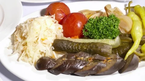 Set of pickled vegetables with herbs Stock Footage 74095621