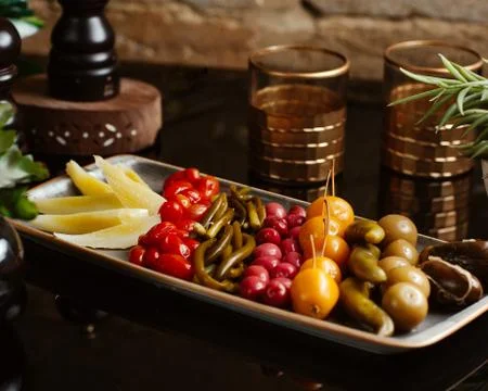 Set of pickles served on plate Stock Photos