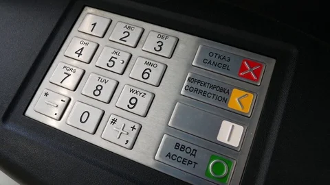 A set of pin code in the ATM. A person enters their password on the ATM keyboard Vidéo 78342574