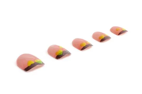 A set of pink false nails isolated on white background Foto stock