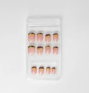 A set of pink false nails isolated on white background Stock Photos
