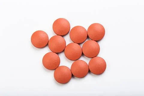 Set of pink tablets  on a white background - Image Stock Photos