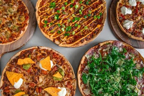 Set of pizzas isolated on white background Stock Photos