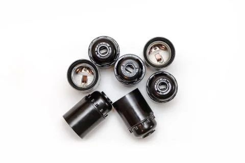 Set of plastic and ceramic electric cartriges for bulb isolated on white. Top Stock Photos