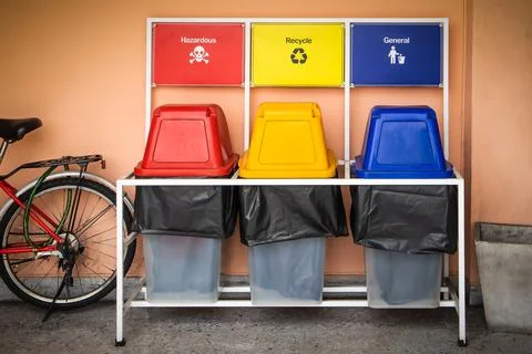 Set of plastic bins for different waste types and bicycles, Backgrounds Stock Photos