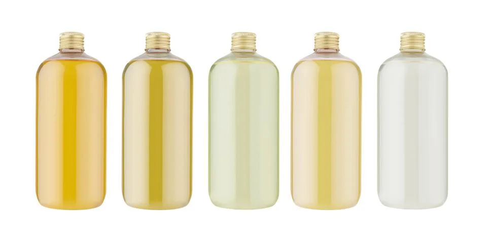 Set of plastic bottles containing a different colors liquid oil with a shiny  Stock Photos