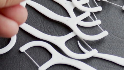 Set of plastic white dental toothpicks isolated on black background. Stock-Footage 165334036