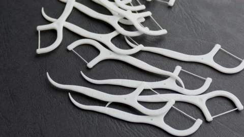 Set of plastic white dental toothpicks isolated on black background. Stock Footage 165335151