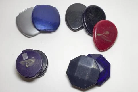 Set of powder cases different base form and color Stock Photos
