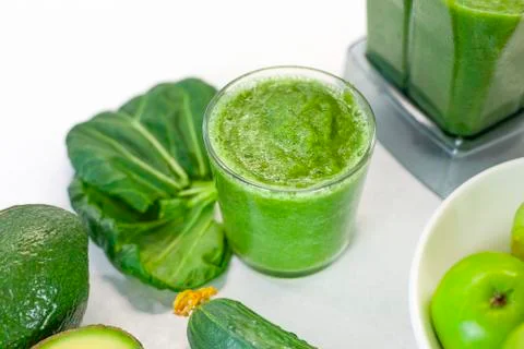 Set of products on the kitchen table for preparing a healthy green smoothie Stock Photos