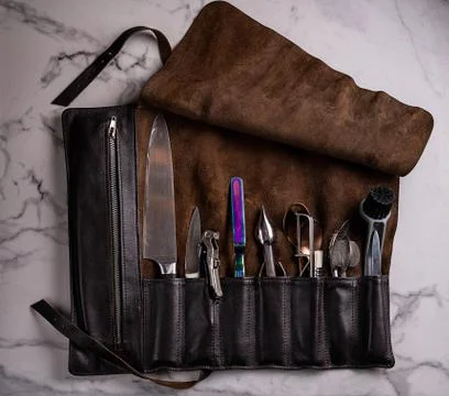 Set of professional cook tools. Special case of cook knives. View from above Stock Photos