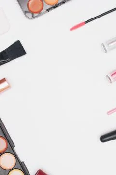 Set of professional cosmetics, makeup tools and accessories isolated on white Stock Photos