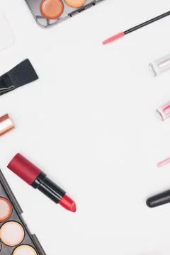 Set of professional cosmetics, makeup tools and accessories isolated on white Stock Photos