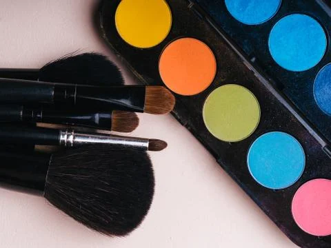 Set of professional makeup brushes and a palette Stock Photos