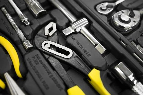 Set of the professional tools. Closeup of chrome wrench tools organized in .. Stock Photos