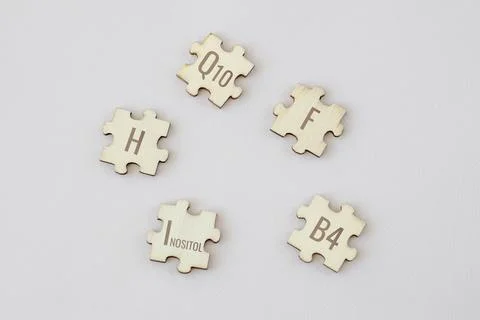 Set of puzzles with 5 biologically important elements with inscriptions on a Stock Photos