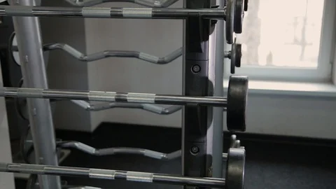 Set, a rack of dumbbells of different sizen for training, close-up. Stock Footage 103394861