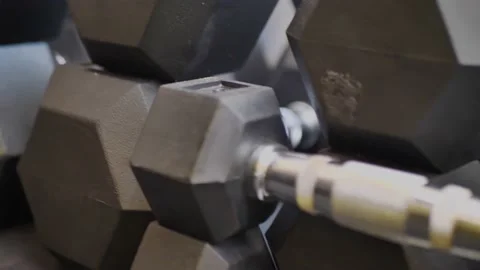 Set, a rack of dumbbells of different sizen for training. close-up Stock Footage 207167149