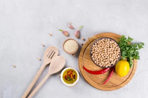Set of raw ingredients for making hummus. Middle eastern cuisine. Top view Foto stock
