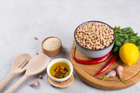 Set of raw ingredients for making hummus. Middle eastern cuisine. Stock Photos