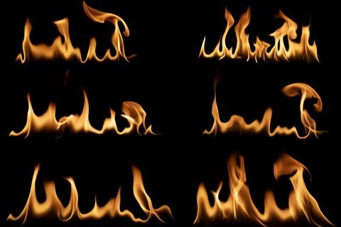 Set of realistic fire flames isolated on black background for graphic design Stockfoto's