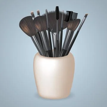 A Set of Realistic Make Up Brushes standing in a glass. Vector illustration Stock Illustration