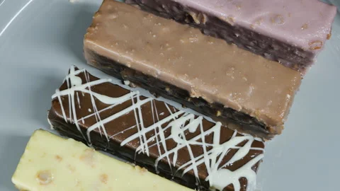 Set of rectangular ice cream bars in glaze of different colors and flavors 스톡 동영상 167603756