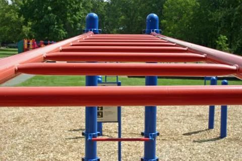 A set of red bars in an empty playground Stock Photos