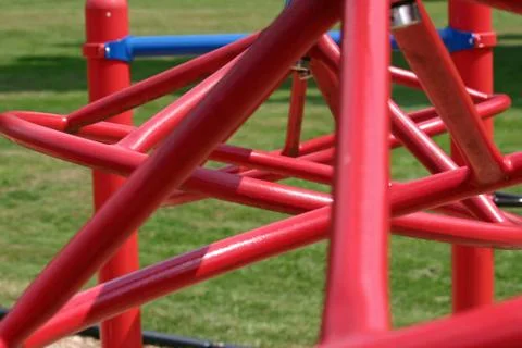 A set of red bars in an empty playground Stock Photos