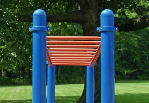 A set of red bars in an empty playground Stock Photos