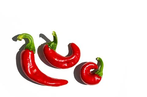 Set of red chilli pepper on white. Organic, home growing chili peppers. Stock Photos