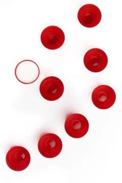 Set of Red cups on table isolated on white background - image Stock Photos
