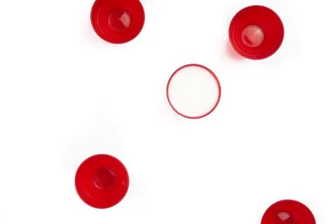 Set of Red cups on table isolated on white background - image Stock Photos