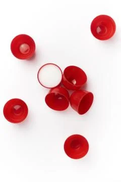 Set of Red cups on table isolated on white background - image Stock Photos