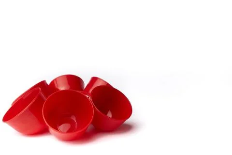 Set of Red cups on table isolated on white background - image Stock Photos