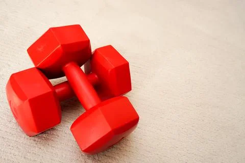 Set of red dumbbells on isolated background Stock Photos