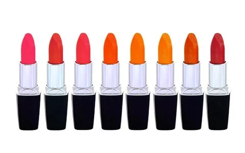 Set of red lipsticks isolated on white reflective background Stockfoto's