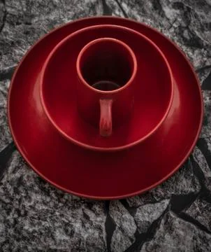 Set of red plate, red bowl and red mug Stock Photos