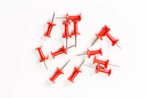 Set of red push pins isolated on white background. Stock Photos