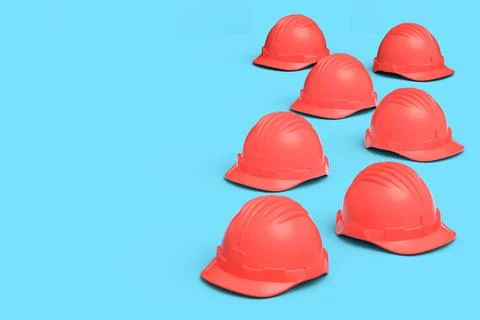 Set of red safety helmets or hard caps isolated on blue background Stock Illustration