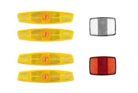 A set of reflective elements for a bicycle. Close up. Isolated on a white bac Stock Photos