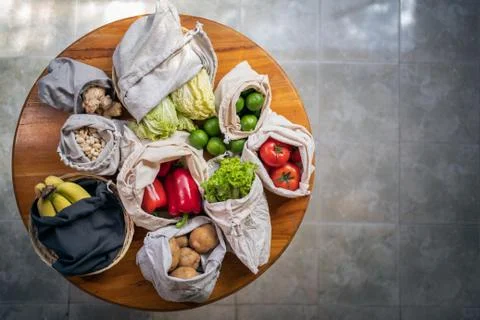 Set of reusable and zero waste cotton shopping bags for food Stock Photos