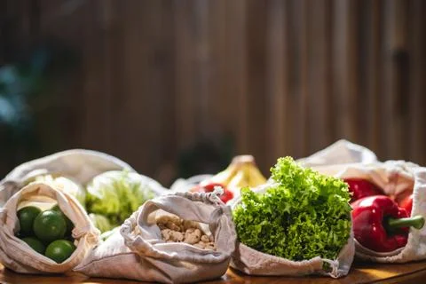 Set of reusable and zero waste cotton shopping bags for food Stock Photos