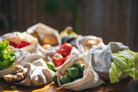 Set of reusable and zero waste cotton shopping bags for food Stock Photos
