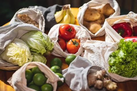 Set of reusable and zero waste cotton shopping bags for food Stock Photos