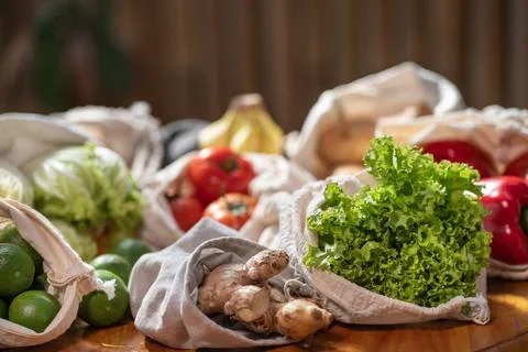 Set of reusable and zero waste cotton shopping bags for food Stock Photos