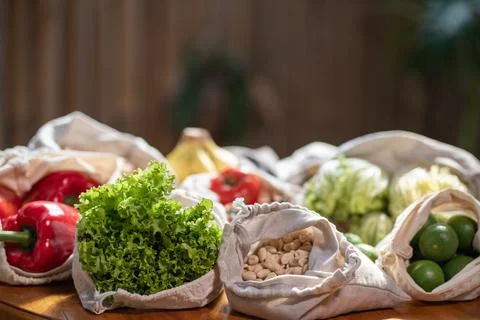Set of reusable and zero waste cotton shopping bags for food Stock Photos