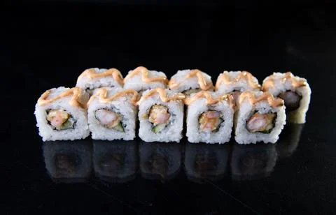 Set rolls in a row on a black background Stock Photos