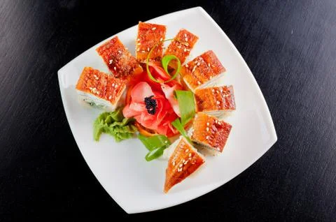 Set of rolls on a wooden dark table. Stock Photos