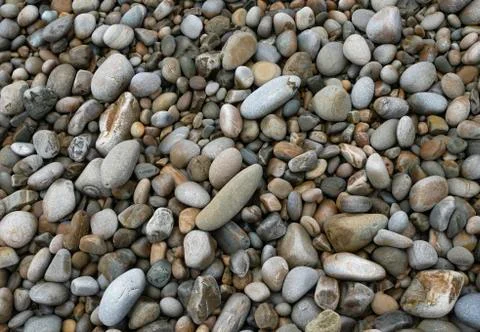 Set of rounded stones on a beach Stock Photos